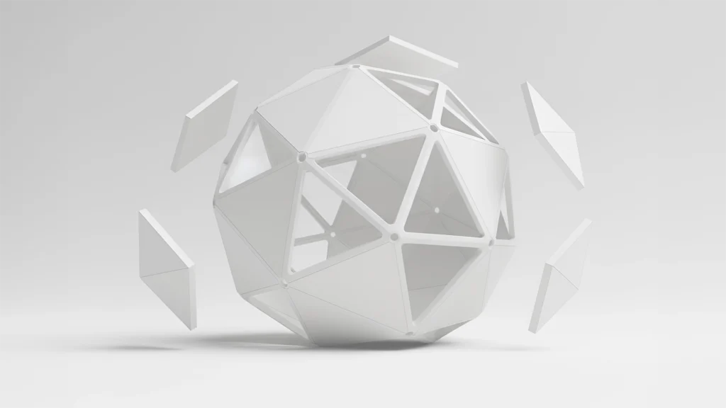 Volume géométrique facetté partiellement assemblé, illustrant une structure architecturale en cours de conception